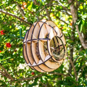 Personalized bird house made of wood, a delightful addition to outdoor spaces.